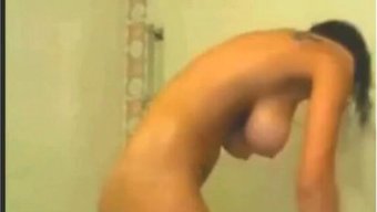 Amateur Busty Babe Takes A Shower On Webcam