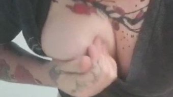 Tattooed Girl Flaunts Her Body In This Solo Masturbation Video